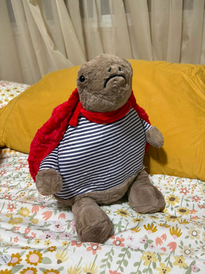 Grumpy Superhero Turtle Plush Toy – Striped Shirt & Red Cape
 - 30 cm