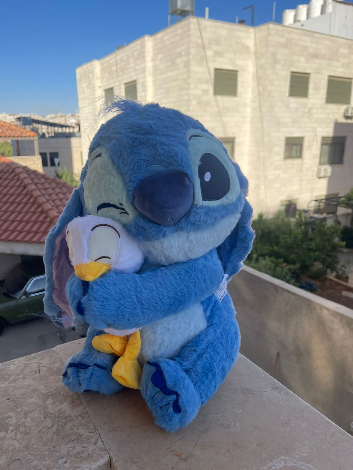 Stitch holding a duck plush toy (70 cm )