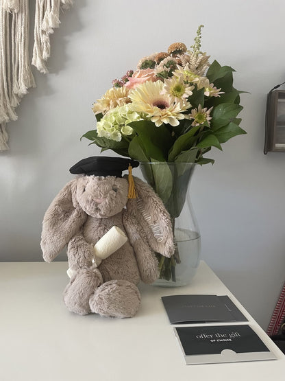 A 30 cm cute plush graduation bunny holding a degree and wearing a mortarboard cap.04