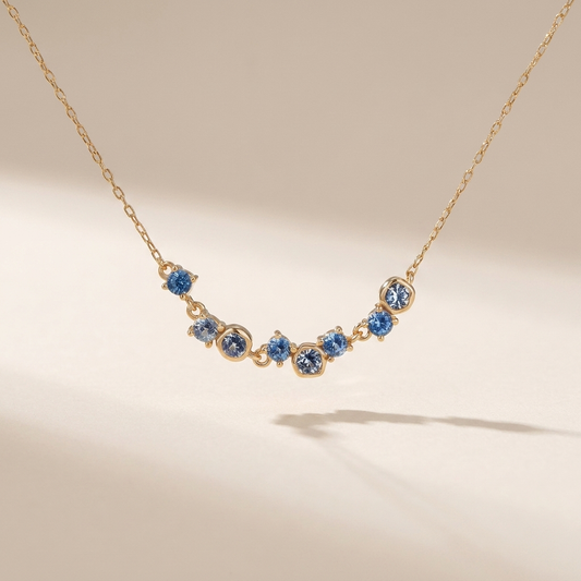 Scattered Blue Zircon Curved Necklace – Gold Plated 925 Sterling Silver