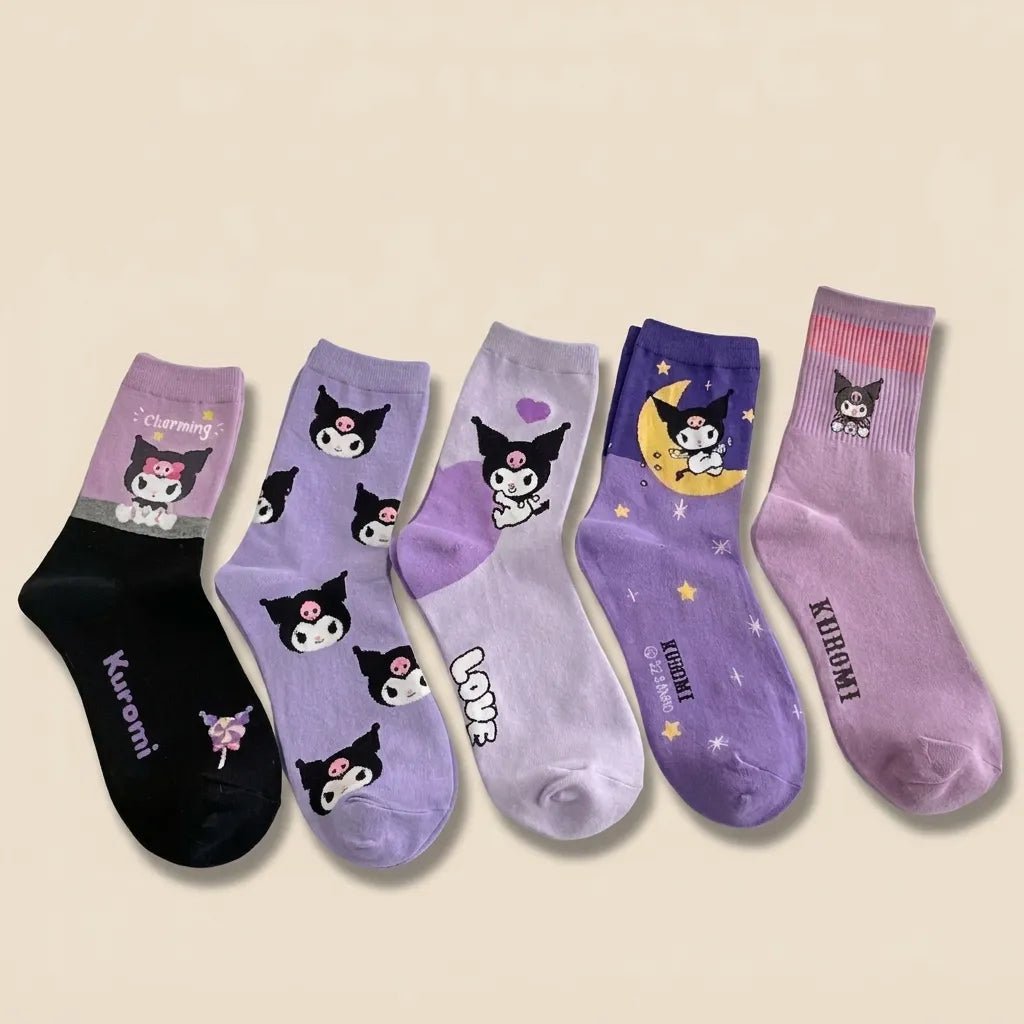 Five pairs of Kuromi-themed crew socks in various colors and patterns, arranged in a fan shape on a light beige background.
