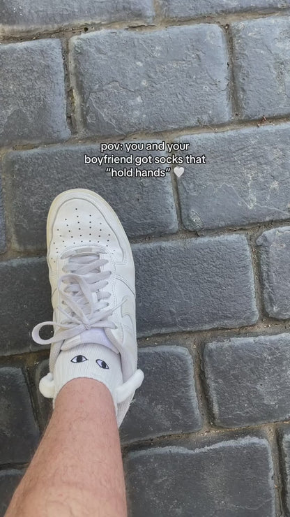 Holding hands matching socks